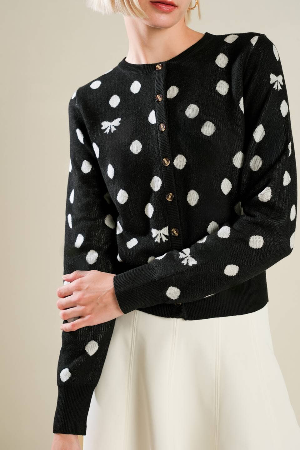 Cardigan with polka dots and bows